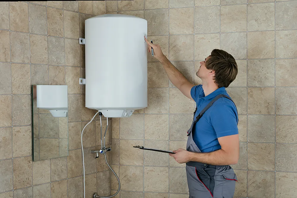 Técnico preparando materiales de calefacción en Torres